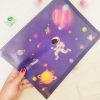 عکس پوشه فانتزی سایز A4 طرح فضانورد و کهکشان